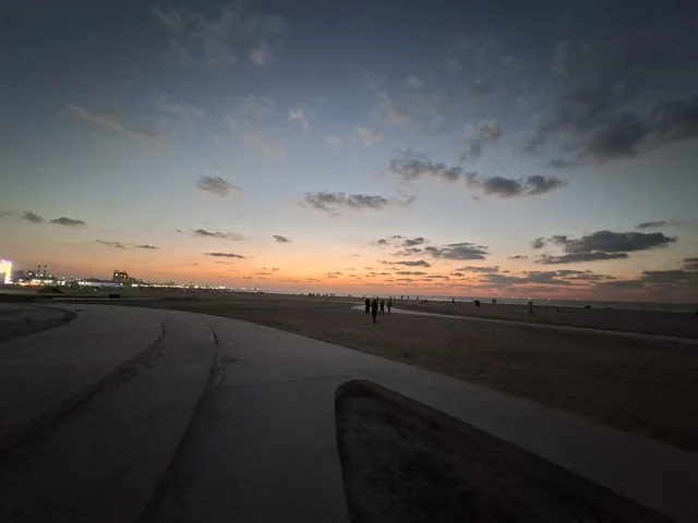 Wide Angle Beach Promenade Sunset with Skyline View