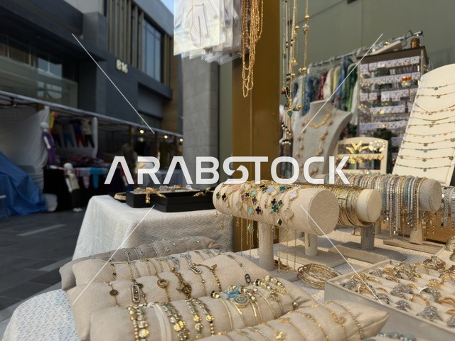 Gold accessories and jewelry at the East Event in the Eastern Province, Saudi Arabia, on February 6, 2026, a comprehensive entertainment and cultural experience celebrating the spirit of community and creativity, live artistic performances, youth activities, interactive activities, diverse food areas, local exhibitions and projects, vibrant festive atmosphere, a modern social experience reflecting the identity of the Eastern Province and its cultural and entertainment diversity.