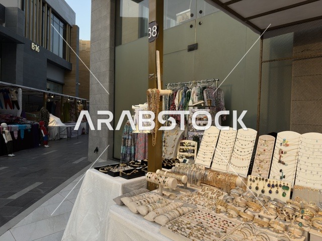 Gold accessories and jewelry at the East Event in the Eastern Province, Saudi Arabia, on February 6, 2026, a comprehensive entertainment and cultural experience celebrating the spirit of community and creativity, live artistic performances, youth activities, interactive activities, diverse food areas, local exhibitions and projects, vibrant festive atmosphere, a modern social experience reflecting the identity of the Eastern Province and its cultural and entertainment diversity.