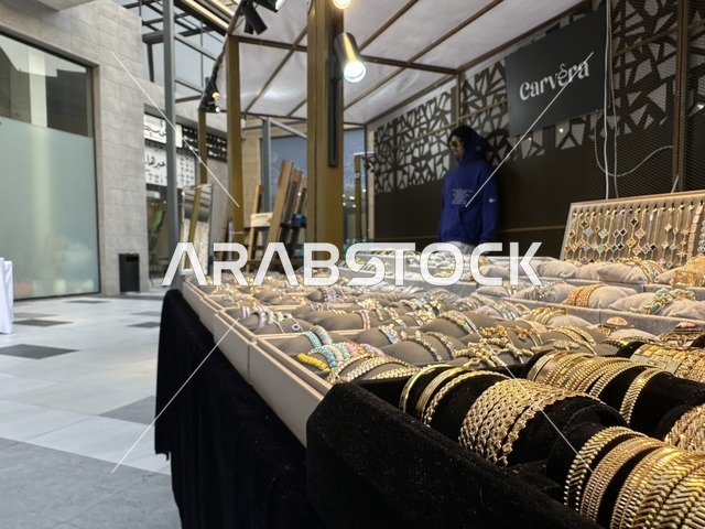 Gold accessories and jewelry at the East Event in the Eastern Province, Saudi Arabia, on February 6, 2026, a comprehensive entertainment and cultural experience celebrating the spirit of community and creativity, live artistic performances, youth activities, interactive activities, diverse food areas, local exhibitions and projects, vibrant festive atmosphere, a modern social experience reflecting the identity of the Eastern Province and its cultural and entertainment diversity.