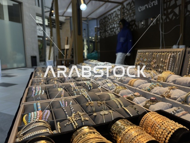 Gold accessories and jewelry at the East Event in the Eastern Province, Saudi Arabia, on February 6, 2026, a comprehensive entertainment and cultural experience celebrating the spirit of community and creativity, live artistic performances, youth activities, interactive activities, diverse food areas, local exhibitions and projects, vibrant festive atmosphere, a modern social experience reflecting the identity of the Eastern Province and its cultural and entertainment diversity.