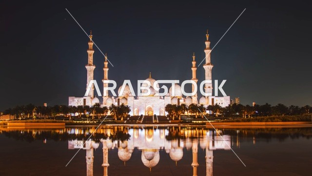 جامع الشيخ زايد الكبير أبوظبي انعكاس ليلي على الماء