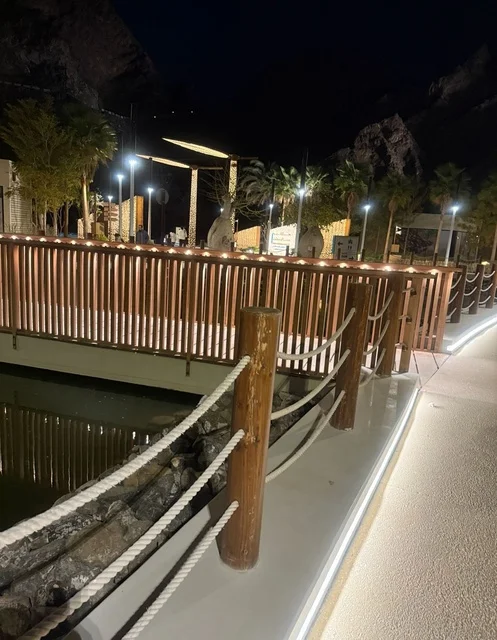 Illuminated Wooden Bridge at Hatta Dam Night
