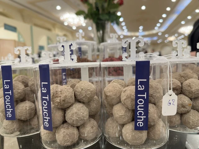 Chocolate truffles at the Ramadan Souk event at Al-Qusaybi Hotel in the Eastern Province, a traditional Ramadan event that brings together the atmosphere of the holy month, popular shops, local products, Ramadan foods, handicrafts, and traditional gifts, in a warm cultural and social experience that reflects the spirit of Ramadan and Saudi authenticity within a luxurious hotel setting.