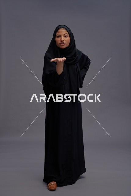 Saudi Woman in Traditional Black Abaya Studio Portrait