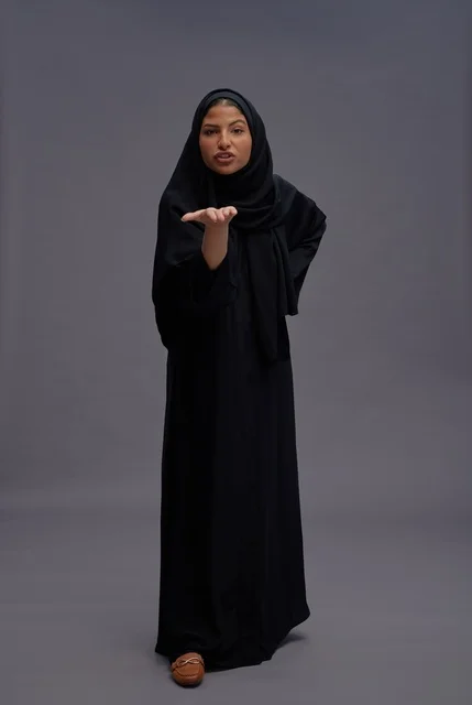 Saudi Woman in Traditional Black Abaya Studio Portrait