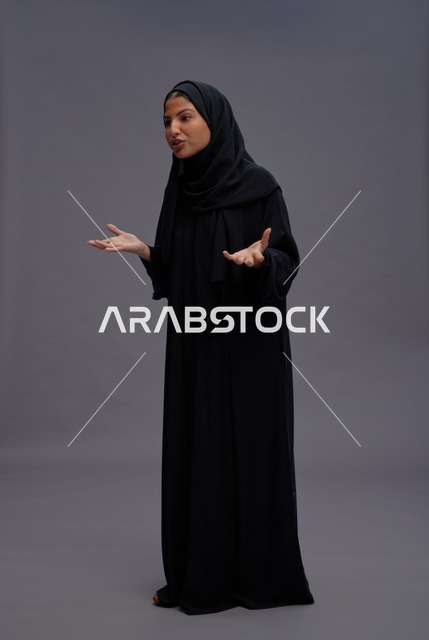 Saudi Woman in Black Abaya Talking in Studio