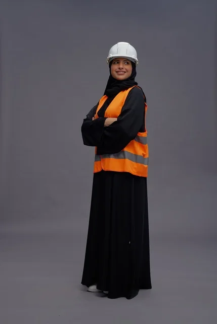 Saudi Female Engineer in Safety Vest and Hard Hat