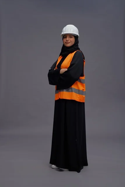 Arab Female Engineer in Safety Vest and Hard Hat