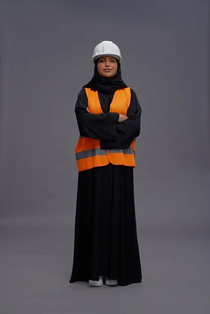 Saudi Female Engineer in Abaya and Safety Vest