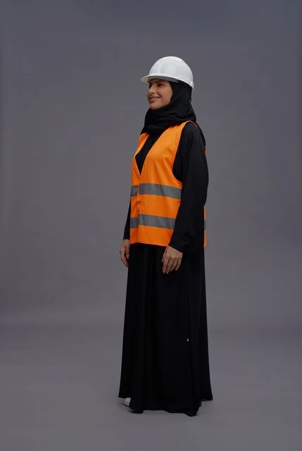 Saudi Female Engineer in Safety Vest Profile View