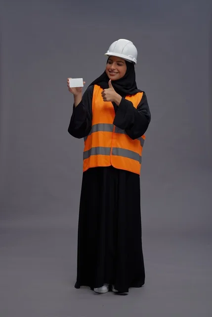 Arab Female Engineer Holding Blank Card and Thumbs Up