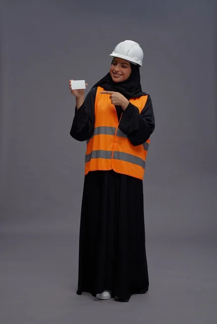 Arab Woman Engineer Holding Blank Business Card