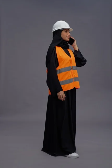 Saudi Female Engineer on Phone with White Safety Helmet