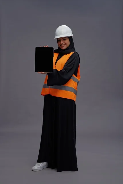 Saudi Female Engineer with Tablet and Safety Gear