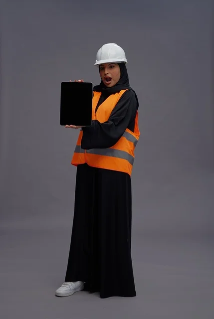Saudi Female Engineer Surprised Holding Blank Tablet