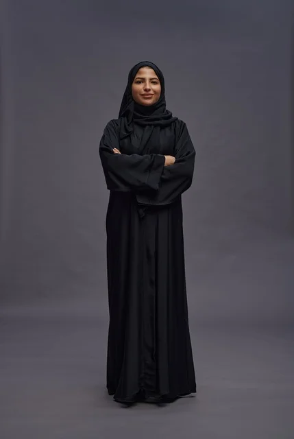 Saudi Woman in Black Abaya with Arms Crossed
