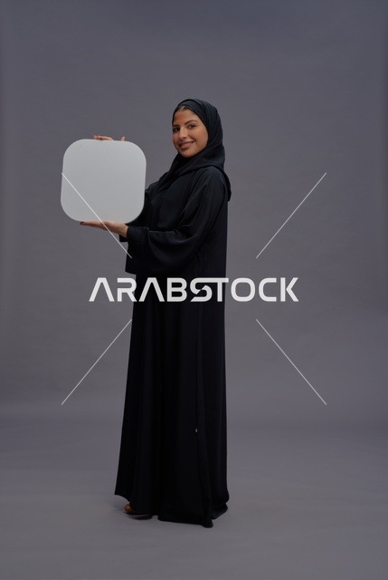 Arab Woman in Black Abaya Holding Blank White Sign Board
