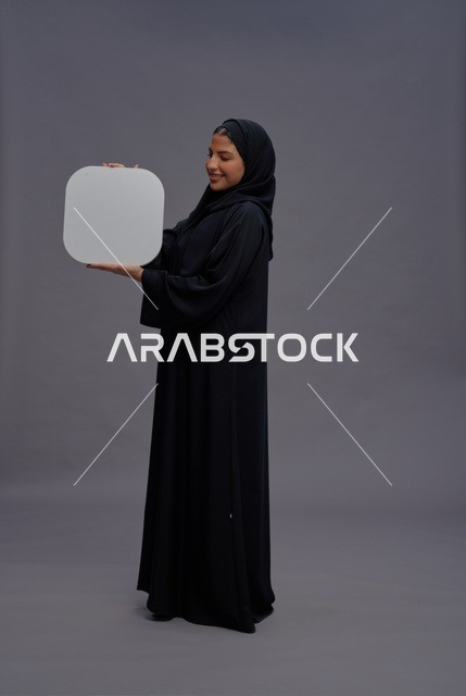 Saudi Woman in Black Abaya Holding Blank White Square Board