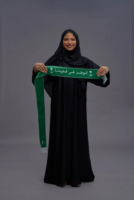 Saudi Woman Holding National Green Scarf Studio Shot