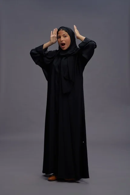 Excited Saudi Woman in Black Abaya Shouting