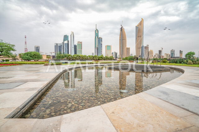 صورة جمالية لأبراج دولة الكويت ، معالم سياحية مشهورة في دولة الكويت ، الفن الهندسي المعماري في دولة الكويت ، ناطحات سحاب في الكويت ، السياحة في دول الكويت ، مباني ومنشآت في مدينة الكويت ، جمال الطبيعة والغيوم في سماء الكويت في فصل الشتاء