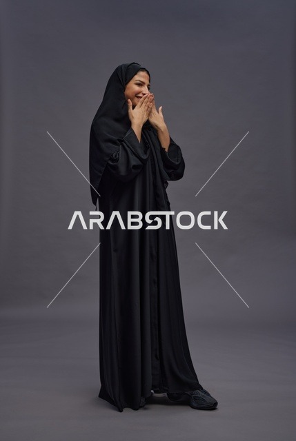 Saudi Woman in Black Abaya Cheerful Studio Portrait