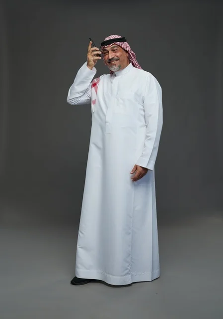 Elderly Saudi Man Talking on Mobile Phone Studio
