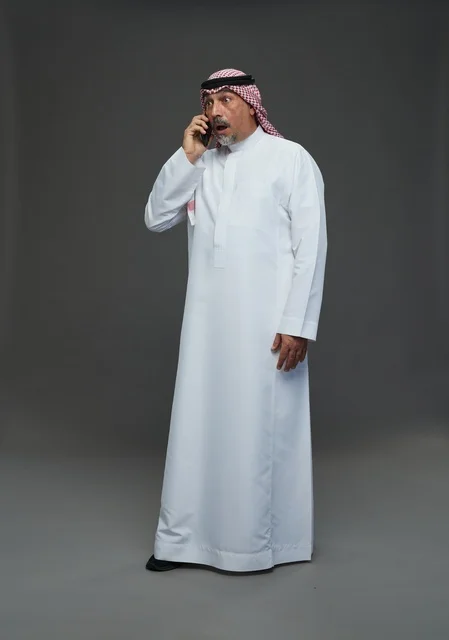 Senior Saudi Man Shocked on Mobile Phone
