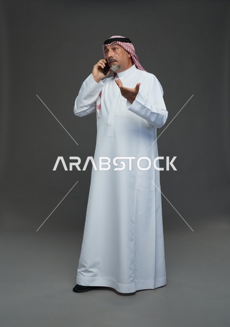 Elderly Saudi Man Talking on Mobile Phone Studio