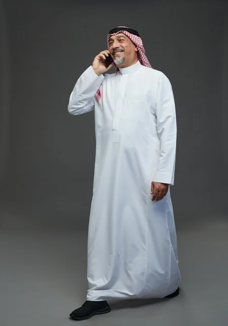 Saudi Elderly Man Talking on Mobile Phone Studio