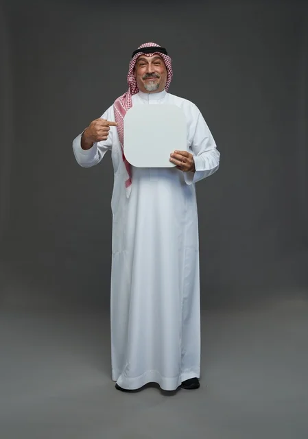 Saudi Senior Man Holding Blank Advertising Board