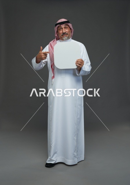 Senior Saudi Man Holding Blank White Advertising Sign