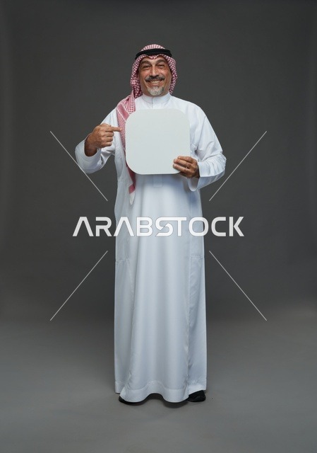 Elderly Saudi Man Holding Blank Board Studio Portrait