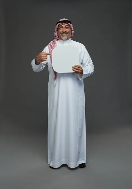Elderly Saudi Man Holding Blank Board Studio Portrait