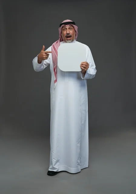 Senior Saudi Man Holding Blank White Board