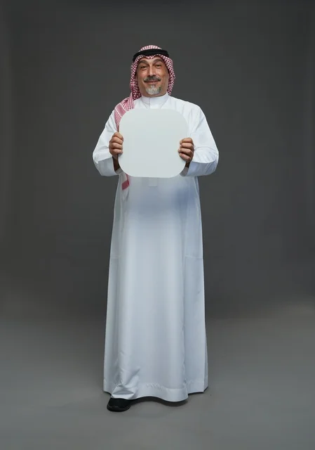 Elderly Saudi Man Holding Blank White Advertising Board