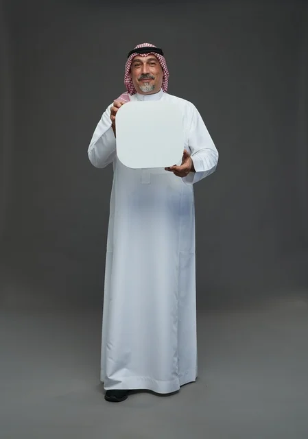 Elderly Saudi Man Holding Blank White Advertising Board