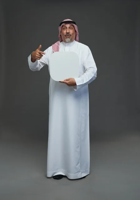 Elderly Saudi Man Holding Blank White Advertising Board