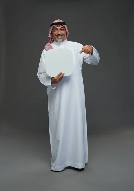 Senior Saudi Man Holding Blank White Advertising Board
