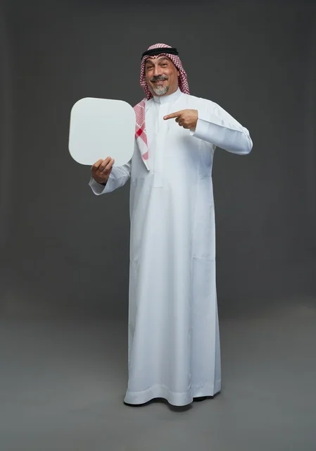 Saudi Senior Man Holding Blank Advertising Sign Board