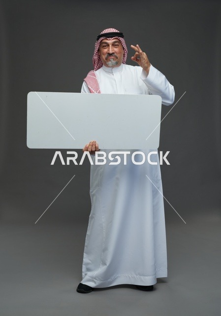 Elderly Saudi Man Holding Blank White Sign Board