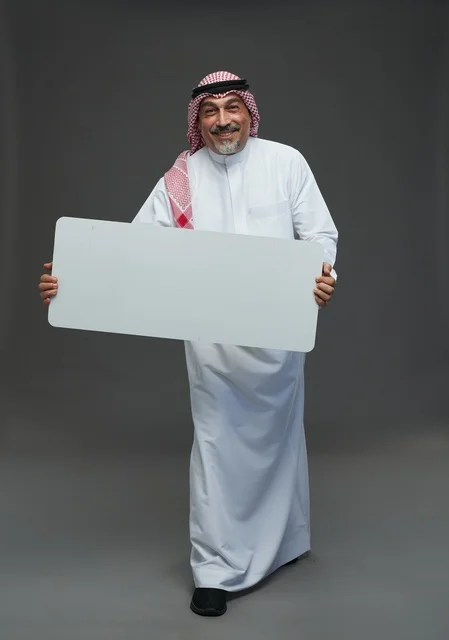 Elderly Saudi Man Holding Blank White Billboard