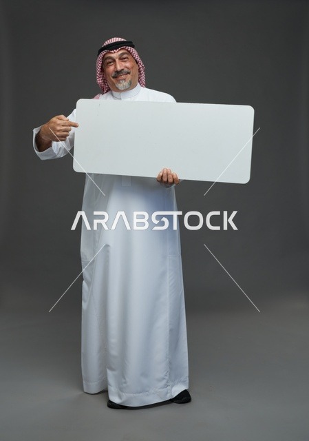 Elderly Saudi Man Holding Blank White Advertising Board