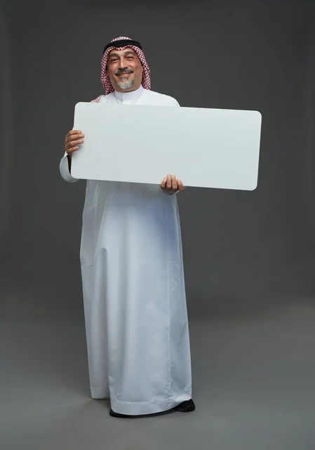 Saudi Elderly Man Holding Blank White Board