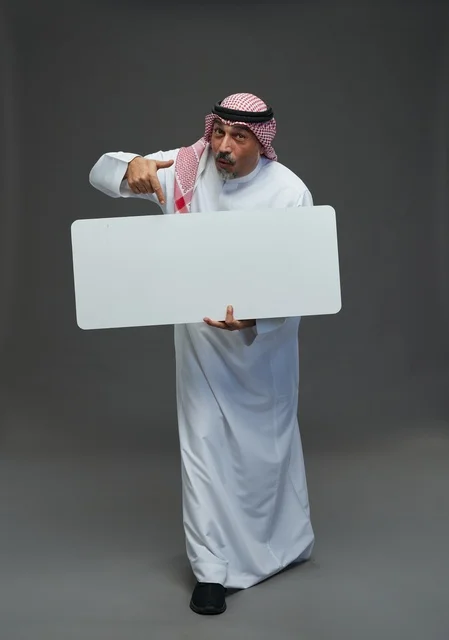 Elderly Saudi Man Holding Blank White Billboard Sign