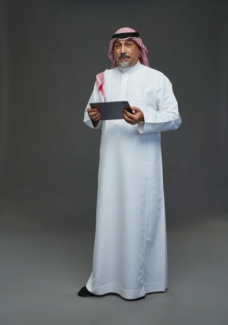 Elderly Saudi Man with Digital Tablet Studio Portrait