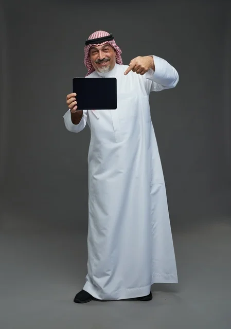 Elderly Saudi Man Pointing at Digital Tablet Studio