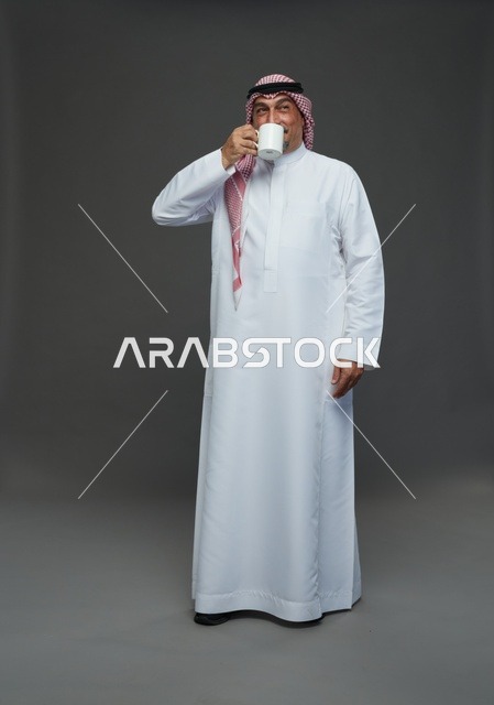 Saudi Elderly Man Drinking Coffee in Studio