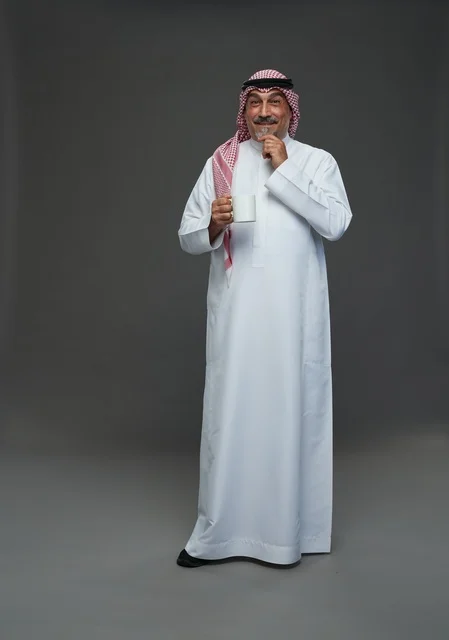 Senior Saudi Man with White Coffee Mug Studio Portrait